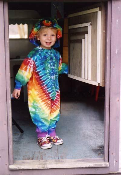 Adin in a Romper with a Floppy Hat